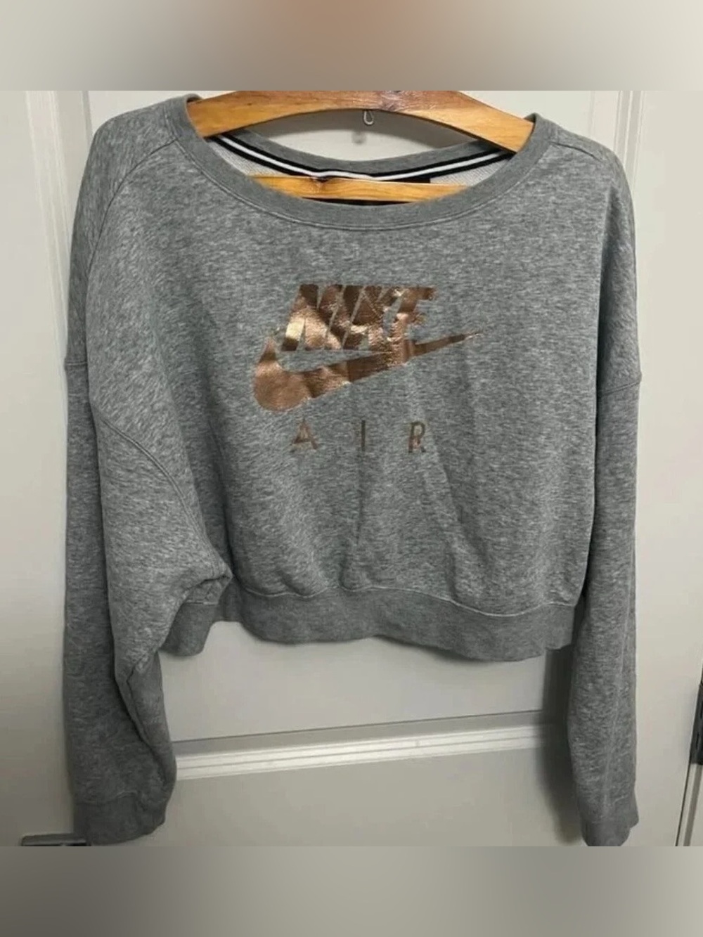 Women Nike Air Cropped Sweatshirt with gold zipper on the back in size M